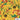 Close-up of Lions Australia custom shirt fabric featuring gold background, native Australian flowers, and Lions International logos for conference apparel.