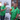 Three men smiling and holding beers while wearing Soft Cogs Sports Uniforms custom Hawaiian shirts with vibrant green cycling-themed design.