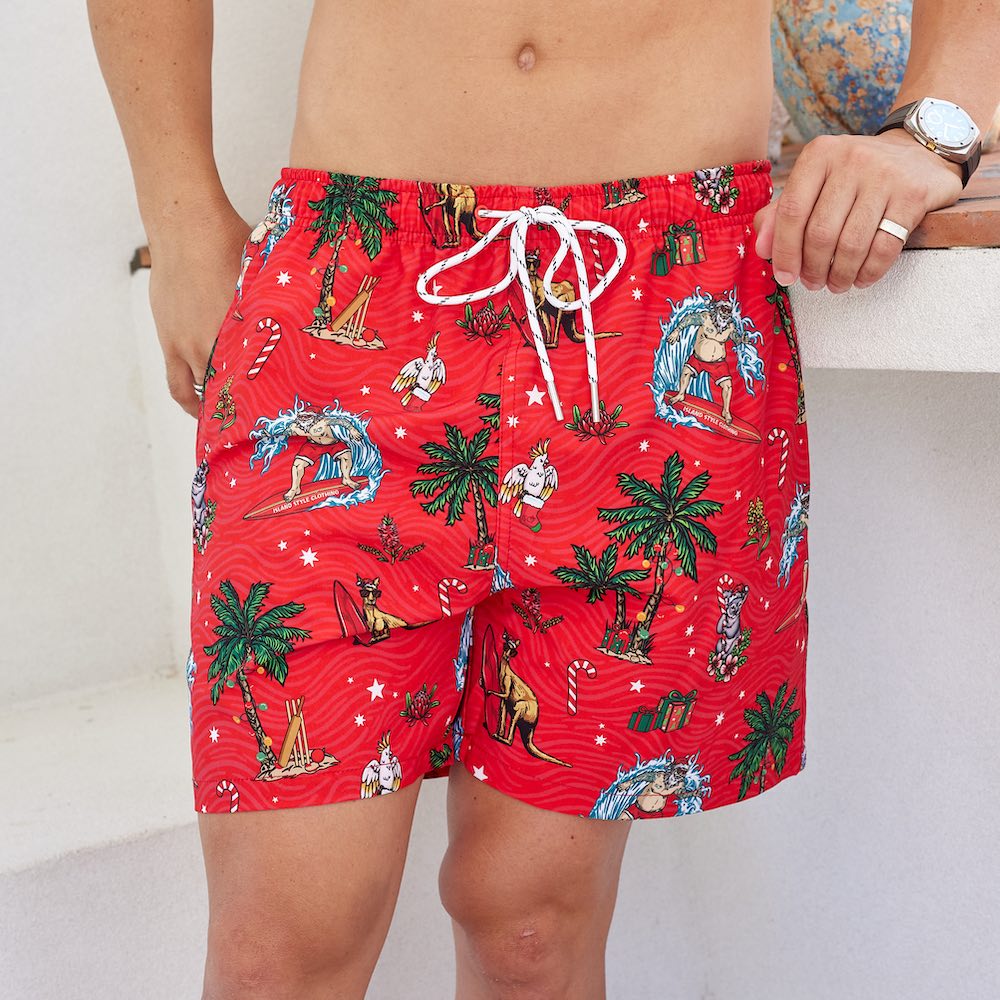 Spice up your summer with a splash of Aussie Christmas Red! These recycled swim shorts are stylish, sustainable, and perfect for the sunny season. With a relaxed fit and playful vibes, enjoy a guilt-free dip while making a splash in the pool!  Designed in-house ready for Christmas in July & December - we've got Claus to celebrate.   Pair with the matching Shirt to be fully decked out. We even have a matching bucket hat. View the Christmas Collection. 