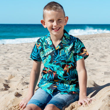 Swoop on this season's must-have! These shirts are going to make the perfect addition to your little boy's wardrobe. A modern tropical shirt made from a breathable and lightweight cotton material makes them perfect for your little grom wearing them in the hot summer months.