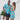 Festive Christmas Pool Party Couple Set with tropical-themed men's shirt and women's dress, ideal for beach or summer holiday celebrations.