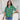 Bring on the holidays! Get festive in our Holidaze Women's Christmas shirt, made of soft rayon material. Featuring colourful and retro Christmas elements like Santa, gingerbread and candy canes on a green base, it's sure to give your wardrobe the jolly treatment it deserves!