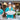 Two people in turquoise shirts with a large ice sculpture and Moët & Chandon branding in an indoor setting.