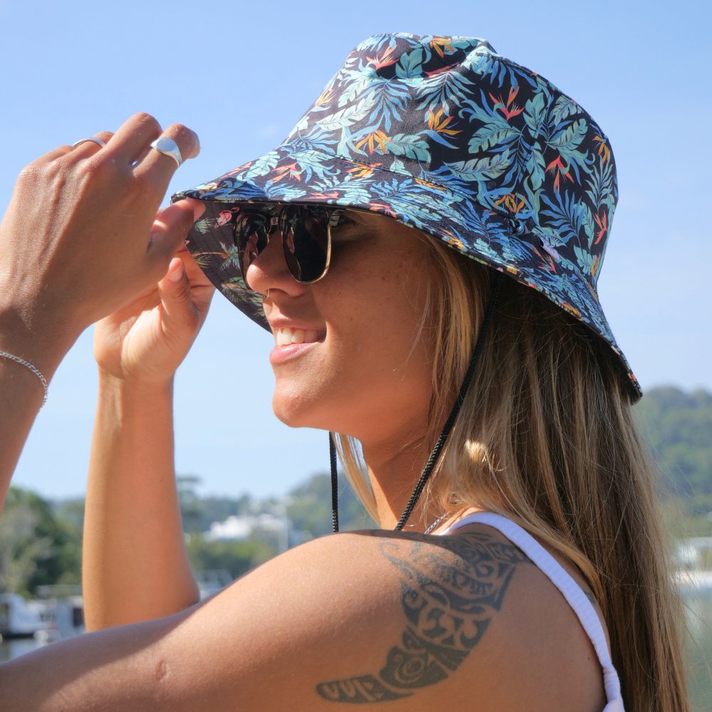 The perfect way to polish off your show-stopping Festival 'fit. Our reversible bucket hats offer two unique designs - one side featuring Jungle Fever and the other, Flamingo Nights - for a double dose of style at a single cost.