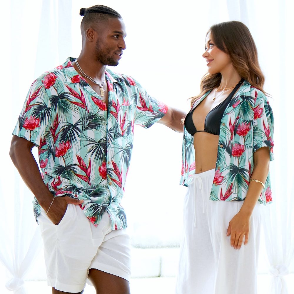 Show off your Australian style with Summer Daze! Our matching Men's Hawaiian Shirt and Women's Crop Shirt have a unique Aussie twist, featuring Waratah flowers and leaves on a white and green stripes. Step out in sunny style with this ultimate couple's look for cruisin' the coast!  Level up the look and add matching Swim Shorts or Unisex Shirts. Shop the Summer Daze Collection. 