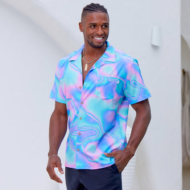 Lucid Dreams; a modern Psychedelic twist to a Hawaiian shirt. Beach season meets festival season! Intense bright colours because you don't have to be woke to make a statement with fashion. Level up the look and add matching Swim Shorts or Bucket Hat. View the Lucid Dreams Collection.