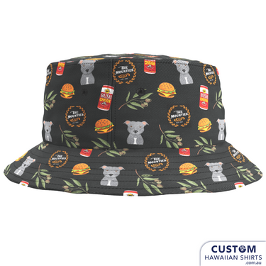 Mount Helena Tavern ordered fun new custom hospitality bucket hats to match their custom uniforms in a modern Aussie look with Bush Chook beer cans, a dog, burgers and gum leaves. A colourful addition to their merch line and staff uniforms and matching pet bandanas. Bucket Hats plus Mens & Womens Hawaiian Shirts