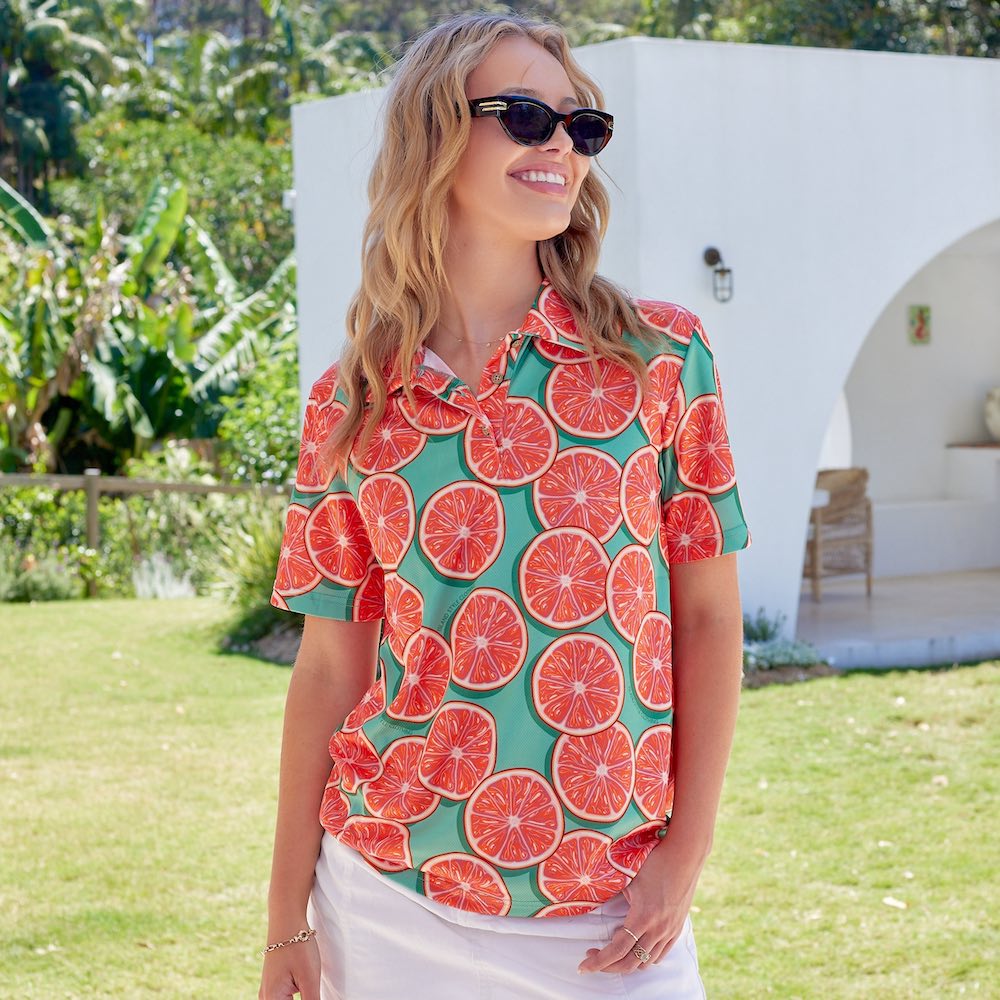 Swing into style with the Groovy Grapefruit Golf Polo Shirt! This lightweight, breathable polo features moisture-wicking technology and UPF 50+ for maximum protection. With a trendy collar and vibrant design, this polo is perfect for hitting the links in groovy, grapefruit-y goodness!