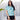 Front view of Under The Sea Womens Hawaiian Shirt styled with black shorts. A tropical shirt for resort stays and summer getaways.