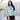 Front view of Under The Sea Womens Hawaiian Shirt styled with black shorts. A tropical shirt for resort stays and summer getaways.