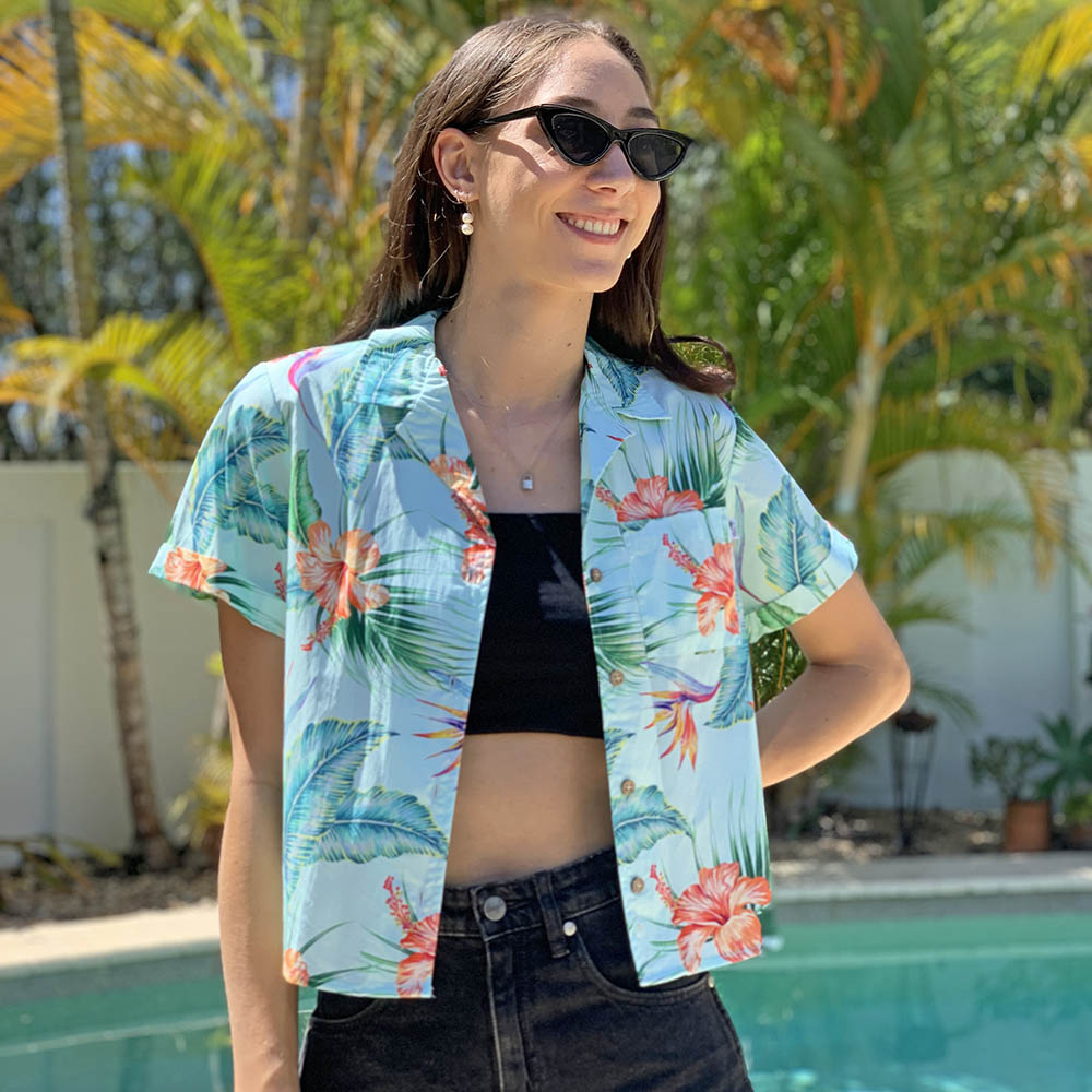 Step into summer in this Paradise Hawaiian Crop Shirt, this shirt steers itself away from the ordinary. Pair the Crop Shirt with Hawaiian Shorts to create a cute summer fit! We even have the matching Men's Hawaiian Shirt for your partner.