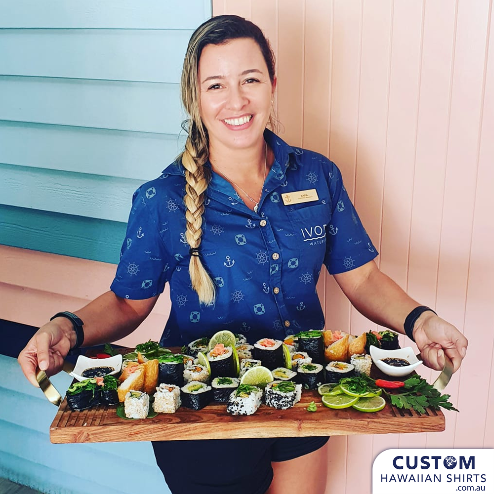 A Stein of good taste..this understated nautical number for Ivory Waterside Hotel is certainly see-worthy. A customised arrangement of anchors, waves and lifebuoy rings amid a deep blue background. Sharp new custom hawaiian shirt hospitality uniforms.