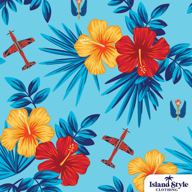 Close-up of 1FTS RAAF Military Squadron custom fabric design featuring red planes, yellow and red hibiscus flowers, and blue tropical leaves.