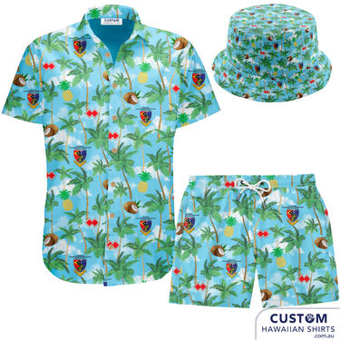Defence Cooperation Program – Timor Leste  Showcasing some new Bucket Hats as well as custom shirts, shorts designed and despatched to Timor Leste to the ADF stationed there. The design features Palms, Pineapples, Coconuts and their logos on a sky blue background with clouds.  Mens Shirts Mens Shorts Bucket hats Embossed coconut buttons