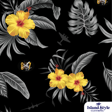 Close-up of 87 SQN ADF custom Hawaiian shirt fabric featuring yellow hibiscus, grey foliage, aircraft silhouettes, and military insignia.