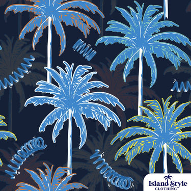 Close-up of Lovells Springs Pty Ltd custom Hawaiian shirt fabric showing blue, green, and orange palm tree graphics on a dark navy background.