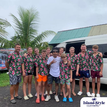Group of people in matching Red Hill Creative - Melon Malarkey custom shirts, showcasing coordinated festival or teamwear from Island Style Clothing.