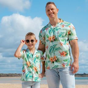 Treat your little one to some summertime fun with the Green Paradise - Kids Unisex Hawaiian Shirt. Made with 100% cotton and totally tropical print, it’s the perfect way to send them off for cruises and casual adventures.  Plus, you can even coordinate the whole fam with matching items! Aloha, summertime! View the Paradise Collection. 