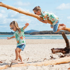 Treat your little one to some summertime fun with the Green Paradise - Kids Unisex Hawaiian Shirt. Made with 100% cotton and totally tropical print, it’s the perfect way to send them off for cruises and casual adventures.  Plus, you can even coordinate the whole fam with matching items! Aloha, summertime! View the Paradise Collection. 