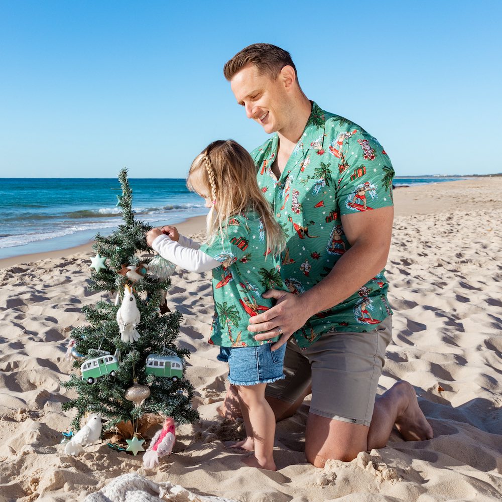 Let your little ones spread some Aussie Christmas cheer with this fun festive shirt! Featuring Surfing Santa and aussie animals, both girls and boys can rock this 100% soft rayon shirt and show their holiday spirit! (Oh, and it's pretty darn cute, too!)