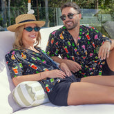 Deck the halls (and your wardrobe) with Christmas Spirits! Get into the holiday spirit with this festive set of matching couple shirts - soft rayon with a black base and colourful cocktails and twinkle lights. Put your happy holiday vibes on display and raise a glass to the perfect holiday look!