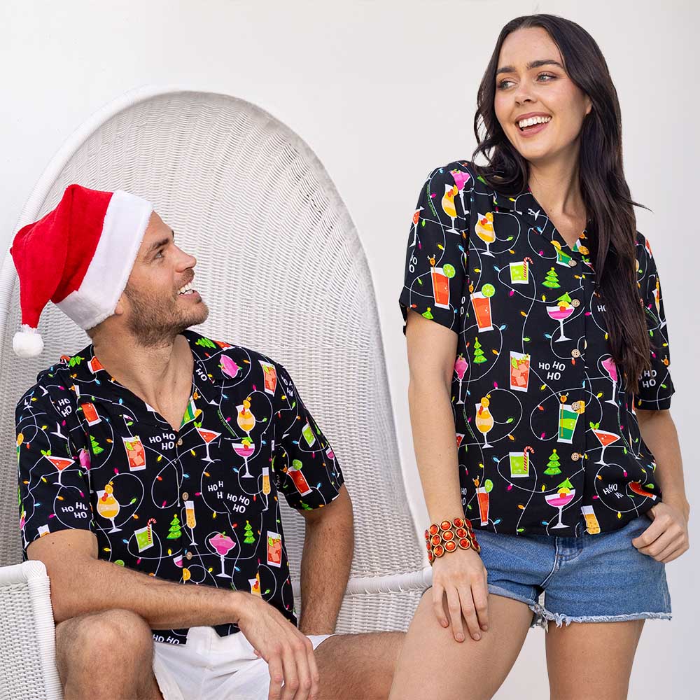 Deck the halls (and your wardrobe) with Christmas Spirits! Get into the holiday spirit with this festive set of matching couple shirts - soft rayon with a black base and colourful cocktails and twinkle lights. Put your happy holiday vibes on display and raise a glass to the perfect holiday look!