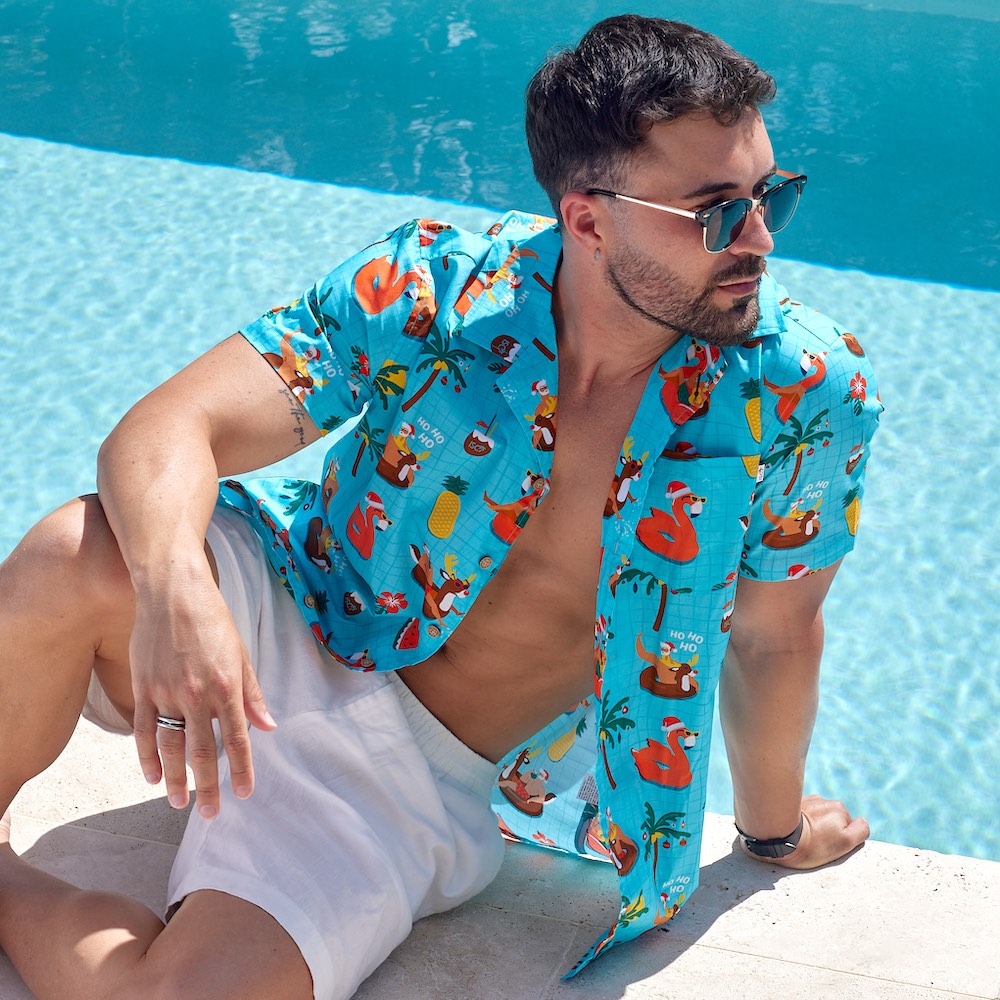 Looking for a shirt to make a splash this holiday season? The Christmas Pool Party shirt is perfect for guys who love to take the plunge in style! Crafted from quality 100% cotton, this festive shirt features Santa sippin' on some cocktails, surrounded by pool floaties and reindeer - plus, we even have the matching shirts for the whole fam! Dive in!