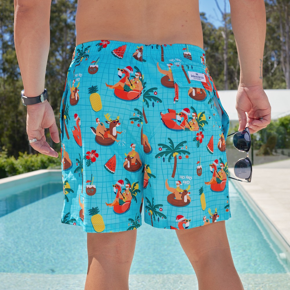 When you hit the pool for yuletide cheer, your outfit is as important as your routine! Stand out from the crowd with these recycled, Christmas-themed swim shorts. Get ready to make a splash and make memories!  Level up the look and add the matching Shirt or a matching Unisex Shirt for her.  View the Christmas Collection. 