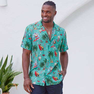 Men's Aussie Christmas Green shirt with tropical holiday prints, part of the couple set ideal for festive and beach-themed celebrations.