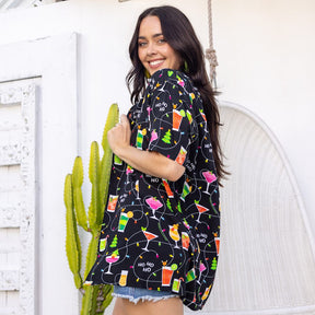 Spread some holiday cheer in this unique Christmas Spirits shirt! Featuring colourful cocktails and twinkling Christmas lights, it's sure to make you shine brighter than any festive Christmas tree. Who says Christmas only comes once a year? ;)
