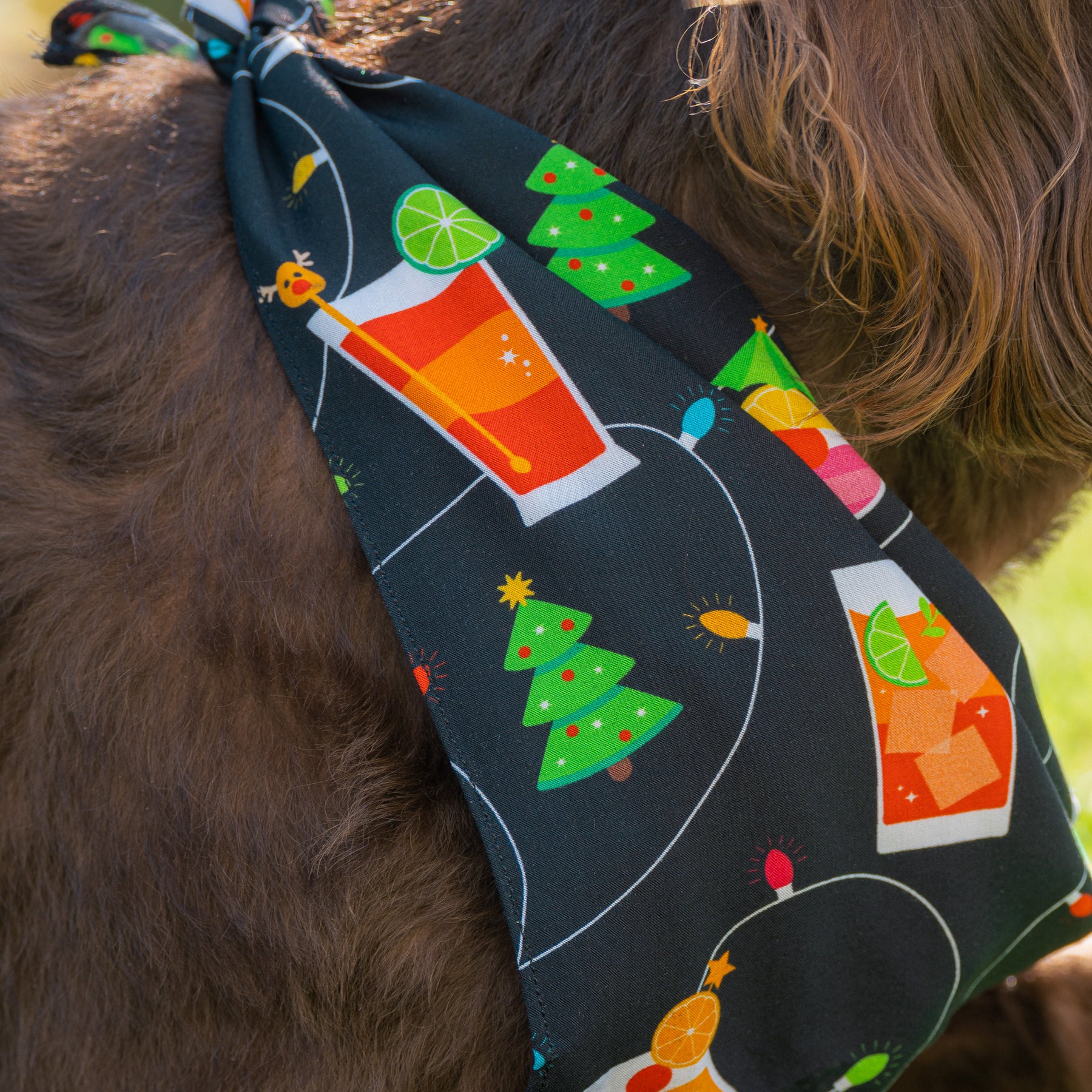 Keep your pup merry this holiday season with a cheerful Christmas Spirits Dog Bandana! This festive accessory features sweet cocktail-themed prints and colourful Christmas lights - sure to make your pup the most paw-pular one at the holiday party! (Cheers!)