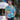 Never be a wave off from holiday fun with this Blue Surfing Santa shirt! This 100% cotton shirt is prepared to keep you cool in the Aussie heat...while keeping you totally rad with holiday cheer. Show off your festive spirit with Santa and his reindeer catching some waves! It's the perfect way to show up matching with the whole fam this holiday season. Even get some bucket hats and you're set! Ho Ho Ho, surf's up!