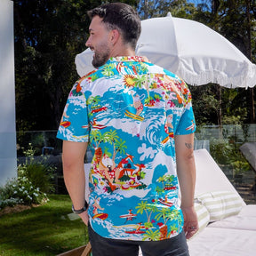 Never be a wave off from holiday fun with this Blue Surfing Santa shirt! This 100% cotton shirt is prepared to keep you cool in the Aussie heat...while keeping you totally rad with holiday cheer. Show off your festive spirit with Santa and his reindeer catching some waves! It's the perfect way to show up matching with the whole fam this holiday season. Even get some bucket hats and you're set! Ho Ho Ho, surf's up!