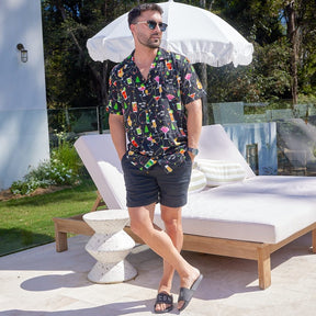 Get ready to party with the Christmas Spirits Men's Festive Shirt! Crafted from 100% rayon, it's the perfect way to show off your Yuletide jollity. With a vibrant Christmas-themed print of cocktails and twinkle lights, this shirt will have your holiday cheer up in lights!