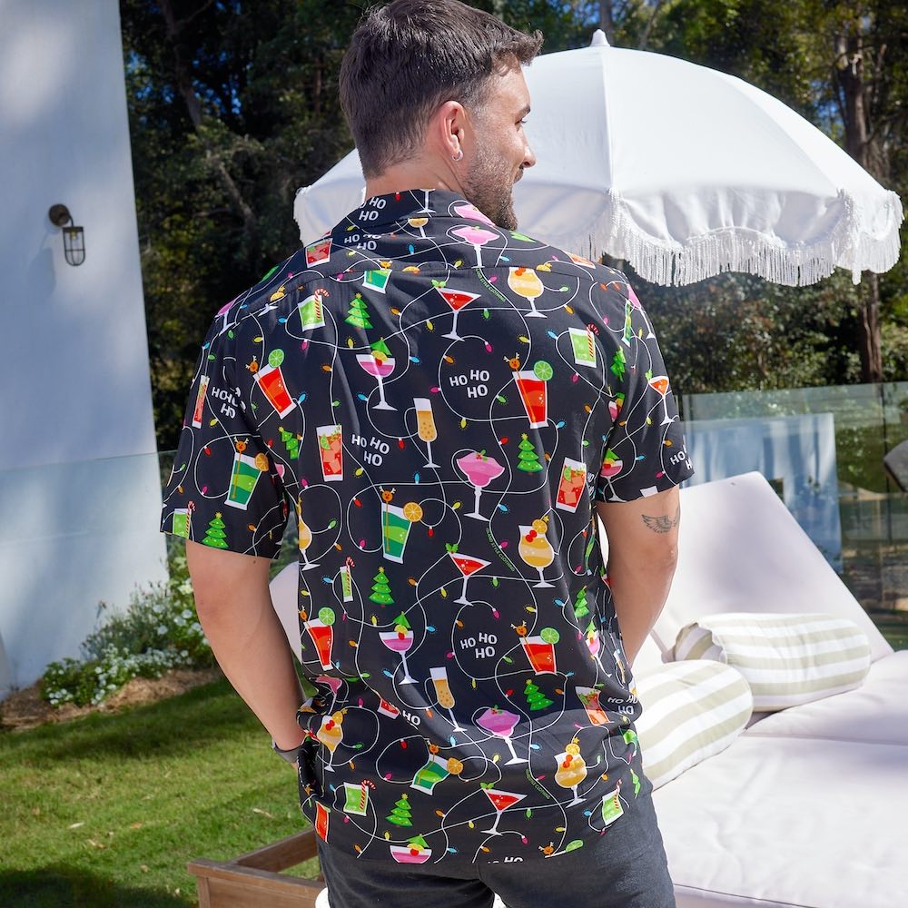 Get ready to party with the Christmas Spirits Men's Festive Shirt! Crafted from 100% rayon, it's the perfect way to show off your Yuletide jollity. With a vibrant Christmas-themed print of cocktails and twinkle lights, this shirt will have your holiday cheer up in lights!
