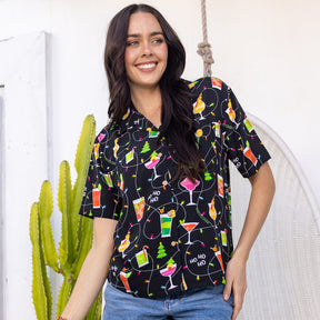 Deck the halls (and your wardrobe) with Christmas Spirits! Get into the holiday spirit with this festive set of matching couple shirts - soft rayon with a black base and colourful cocktails and twinkle lights. Put your happy holiday vibes on display and raise a glass to the perfect holiday look!