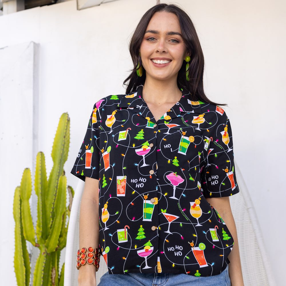 Deck the halls (and your wardrobe) with Christmas Spirits! Get into the holiday spirit with this festive set of matching couple shirts - soft rayon with a black base and colourful cocktails and twinkle lights. Put your happy holiday vibes on display and raise a glass to the perfect holiday look!
