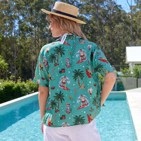 You'll be dashing through the beach in style with this Aussie Christmas Green Women's Festive Shirt! Show off your love for the Land Down Under with this 100% rayon shirt. This shirt features the ultimate Aussie Christmas look - with Surfing Santa, Kangaroos, Koala Bears, Cockatoos and Australian Flora in tow! Strike a festive pose! Make a list.... check it twice... then place your order with Island Style Clothing. 🤙 
