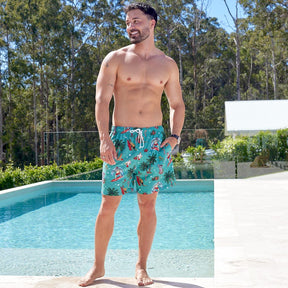 Slip on our Aussie Christmas Green - Festive Swim Shorts and take a dip in style! Made from recycled polyester, these fun-filled shorts feature Surfing Santa, Aussie flowers and animals, and candy canes galore – perfect for a festive beach day! Soak up the sun in your eco-friendly, seriously stoked shorts!