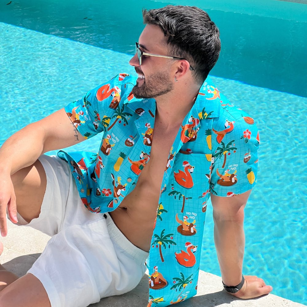 Looking for a shirt to make a splash this holiday season? The Christmas Pool Party shirt is perfect for guys who love to take the plunge in style! Crafted from quality 100% cotton, this festive shirt features Santa sippin' on some cocktails, surrounded by pool floaties and reindeer - plus, we even have the matching shirts for the whole fam! Dive in!