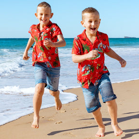 Make Christmas one to remember with our Aussie Christmas Red Festive Shirt! Perfect for all your little mini-mes, this unisex 100% rayon shirt features a red base with a fun surfing santa, aussie animals and flowers motif. Ho ho ho!