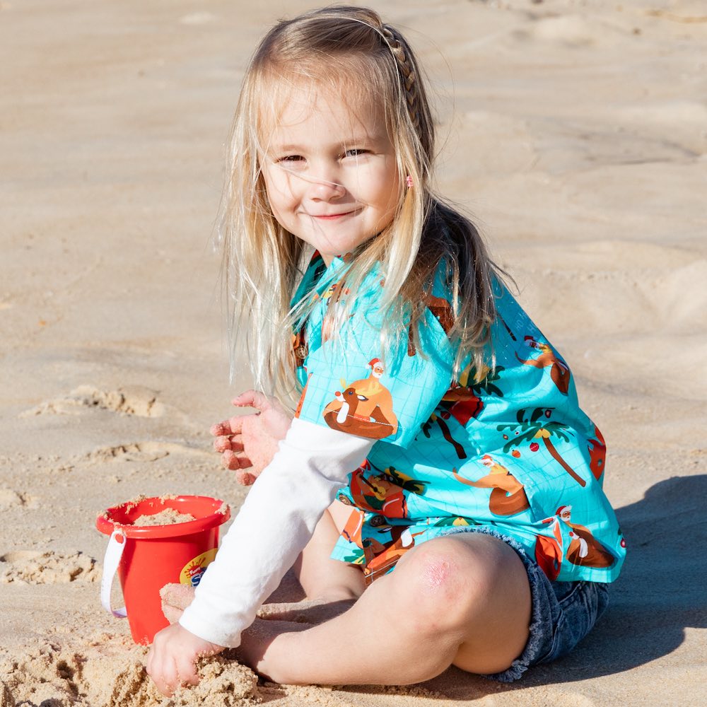 Spread some holiday cheer in this festive Christmas Pool Party shirt! Its 100% cotton fabric makes it ideal for boys and girls, while the bright and bubbly design featuring Santa, flamingos, and other Christmas elements is sure to make a splash! Don't miss out, hit the pool party! 🎉