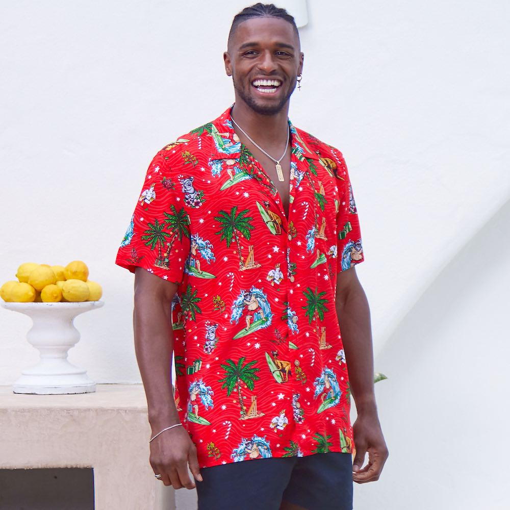 Look your festive best with this Aussie Christmas Red Shirt! This 100% rayon shirt features a bright red base with a surfing Santa, Australian animals, and other Christmas elements — You can also kit out the whole family for the holiday season! Deck the hall with style this year.