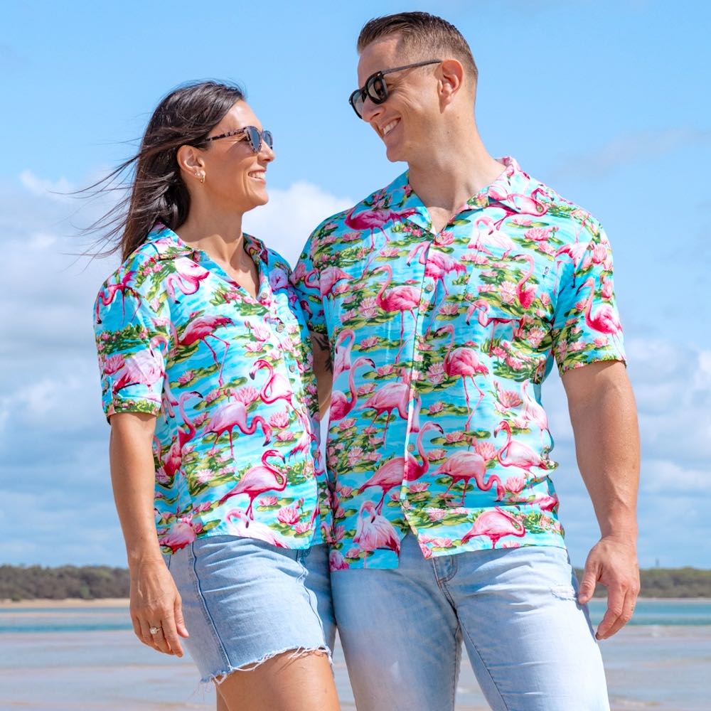 Flip the bird to couture cliches. An eye popping classic exact matching couples Hawaiian shirts set for festivals, cruise away parties, conferences, pub crawls, or even honeymoon.  Shop the Turquoise Flamingo Collection. 