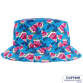 Your other bucket list...finish the look like olives in a martini with that conjoined twin of cool, the bucket hat. 'Custom Hawaiian Shirts' offers lightweight breathable cotton bucket hats to keep you cool and offer sun protection in hot weather.  Reversible with matching custom prints or a contrasting print of your choice. Be completely co-ordinated or change it up with a contrasting print according to your mood. 