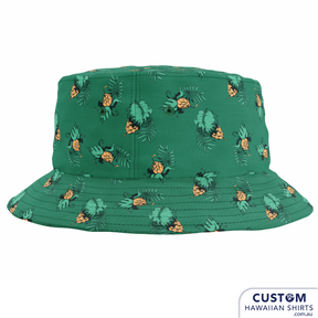 Your other bucket list...finish the look like olives in a martini with that conjoined twin of cool, the bucket hat. 'Custom Hawaiian Shirts' offers lightweight breathable cotton bucket hats to keep you cool and offer sun protection in hot weather.  Reversible with matching custom prints or a contrasting print of your choice. Be completely co-ordinated or change it up with a contrasting print according to your mood. 