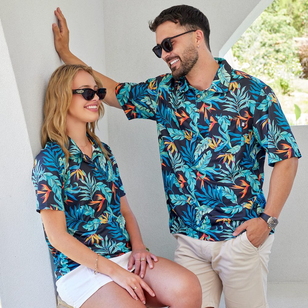 Swing your style into the green with this dynamic duo of Jungle Fever Golf Polo Shirts! Crafted with comfortable moisture wicking Birds Eye Mesh on a classic black base, you and your significant other can look and feel your best on the course!