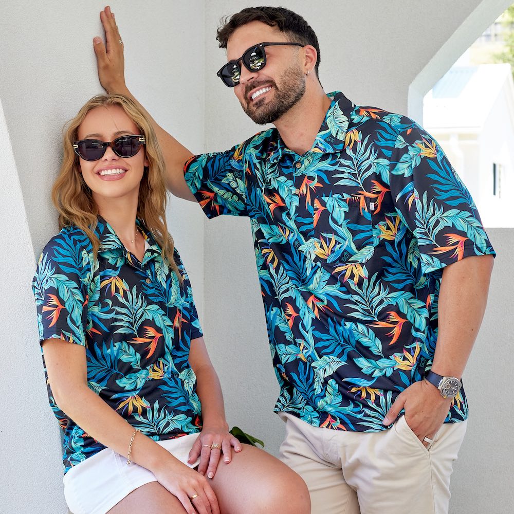 Swing your style into the green with this dynamic duo of Jungle Fever Golf Polo Shirts! Crafted with comfortable moisture wicking Birds Eye Mesh on a classic black base, you and your significant other can look and feel your best on the course!