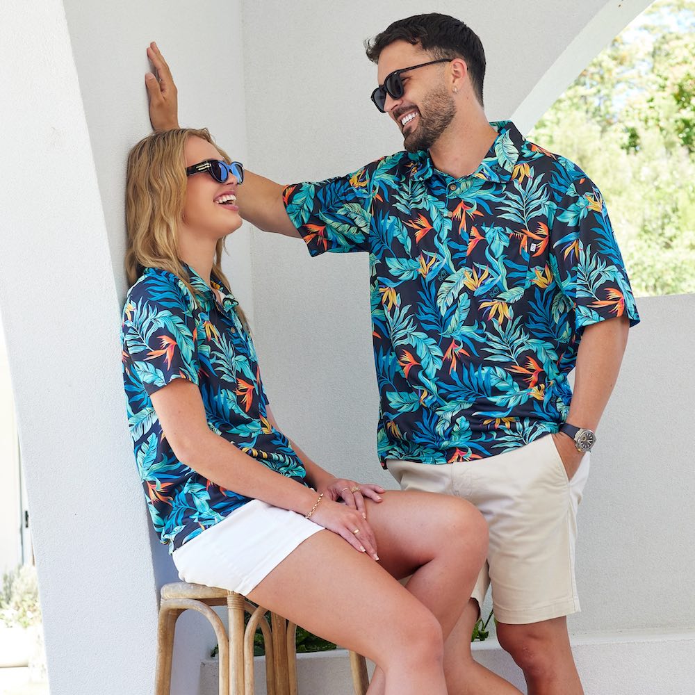 Swing your style into the green with this dynamic duo of Jungle Fever Golf Polo Shirts! Crafted with comfortable moisture wicking Birds Eye Mesh on a classic black base, you and your significant other can look and feel your best on the course!