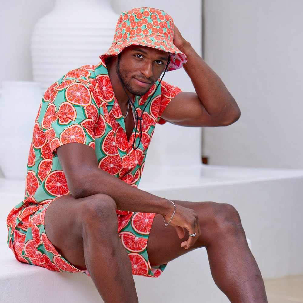 Bringing you the perfect way to top off your show-stopping Festival 'fit. Get two for the price of one with our reversible bucket hats. One side is our Groovy Grapefruit and the other side is our Shake Ya Melons. Pimm's o'clock is approaching; you pour, we've prepped the fruit.  Level up the look with matching Shirts and Shorts. View the Groovy Grapefruit Collection.  ONE SIZE - 60cm Circumference